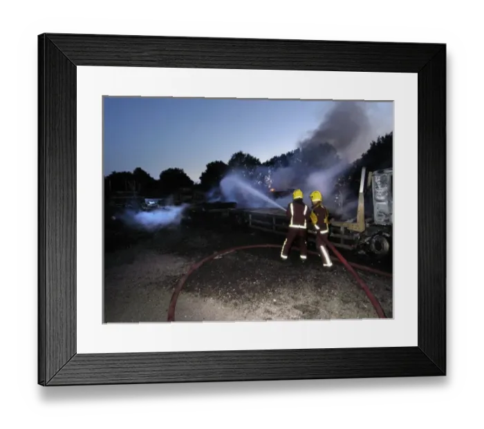 Framed Print : Firefighters at the scene of a fire Framed Print : Firefighters at the scene of a fire