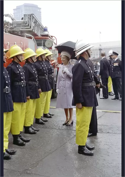 Queen Elizabeth II inspecting firefighters