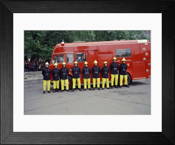 Framed Print : Firefighters on parade in front of their appliance Framed Print : Firefighters on parade in front of their appliance