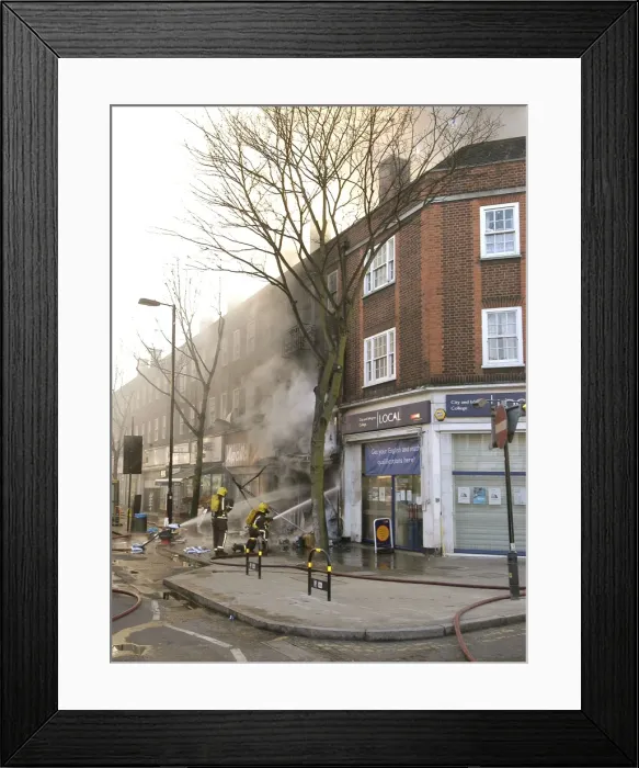 Framed Print : Firefighters at scene of commercial premises fire Framed Print : Firefighters at scene of commercial premises fire