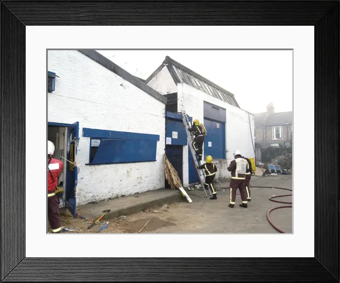 Framed Print : Firefighters at scene of commercial premises fire Framed Print : Firefighters at scene of commercial premises fire