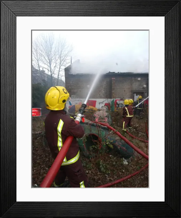 Framed Print : Firefighters at the scene of a warehouse fire, SE London Framed Print : Firefighters at the scene of a warehouse fire, SE London