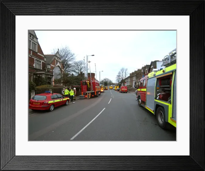 Framed Print : Firefighters at the scene of a warehouse fire, SE London Framed Print : Firefighters at the scene of a warehouse fire, SE London