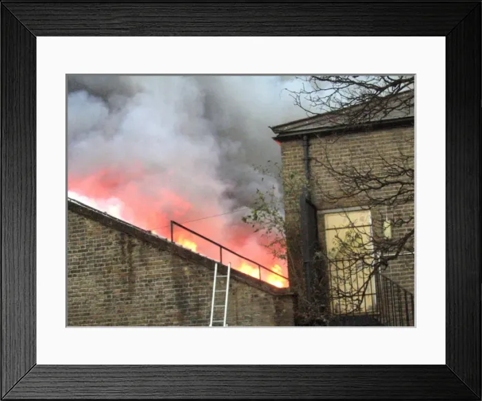Framed Print : Firefighters at the scene of a warehouse fire, SE London Framed Print : Firefighters at the scene of a warehouse fire, SE London
