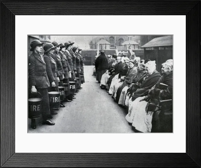 Framed Print : Womens Volunteer Reserve - Fire-fighting Drill at a London Framed Print : Womens Volunteer Reserve - Fire-fighting Drill at a London