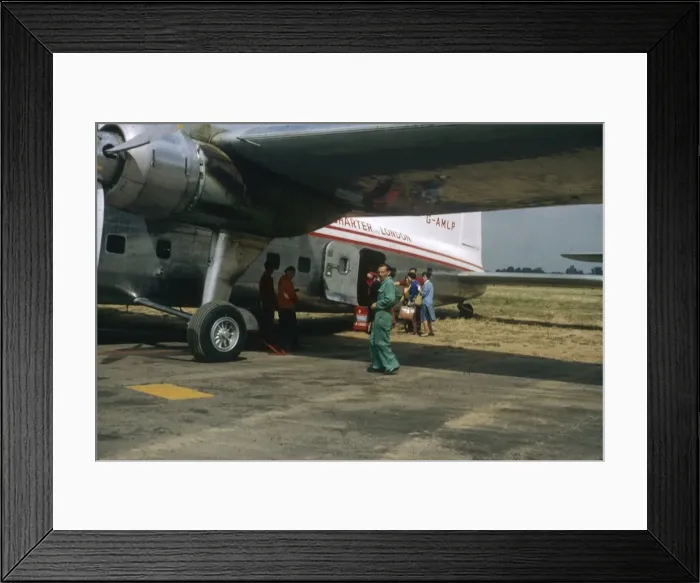 Framed Print : People boarding a small aeroplane Framed Print : People boarding a small aeroplane