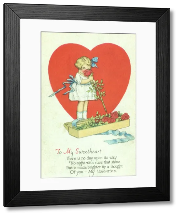 Framed Print : Little girl smelling a rose Framed Print : Little girl smelling a rose