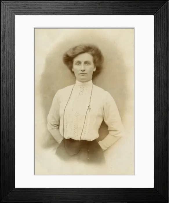 Framed Print : Woman wearing a high-necked broderie-anglaise blouse Framed Print : Woman wearing a high-necked broderie-anglaise blouse