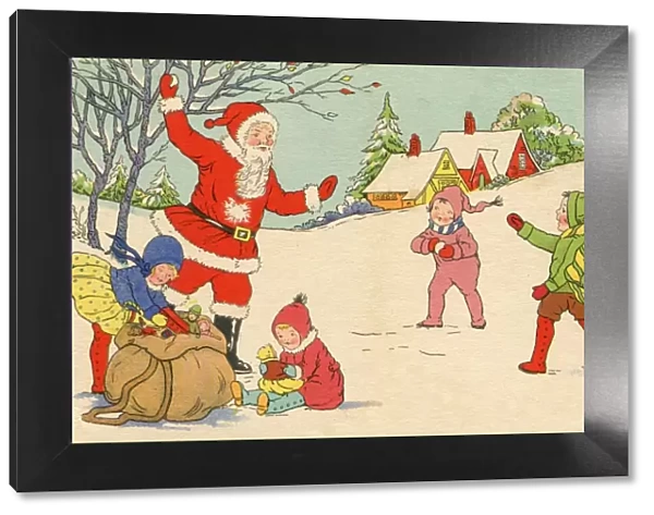Father Christmas and children having snowball fight