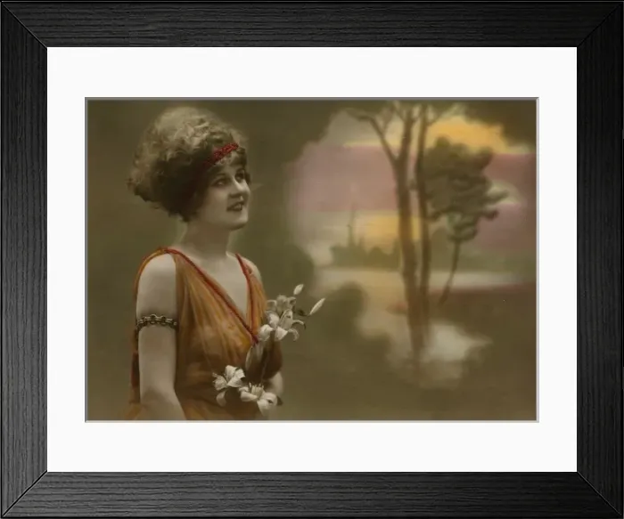 Framed Print : Daydreaming woman holding a bunch of lilies Framed Print : Daydreaming woman holding a bunch of lilies