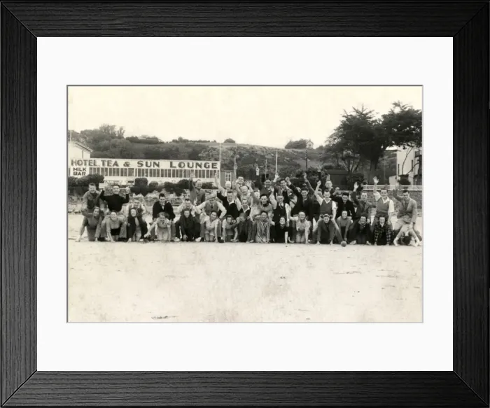 Framed Print : Holidaymakers enjoy a group photograph on the beach Framed Print : Holidaymakers enjoy a group photograph on the beach