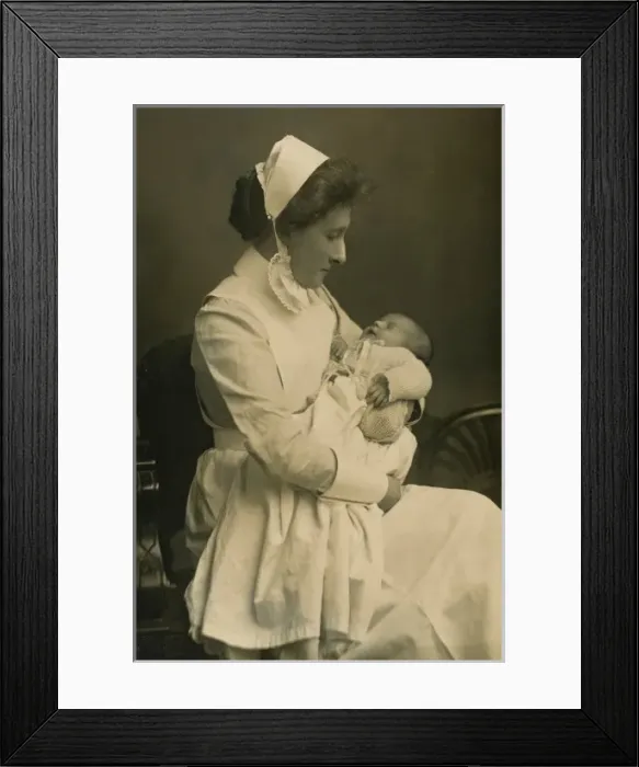 Framed Print : Nurse cradling baby Framed Print : Nurse cradling baby