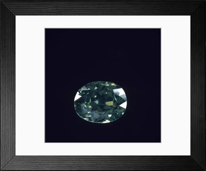 Framed Print : Demantoid garnet cut stone Framed Print : Demantoid garnet cut stone