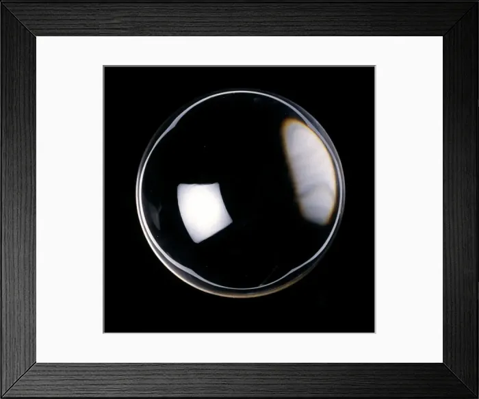 Framed Print : Quartz. A polished ball of quartz (silicon dioxide) from Japan Framed Print : Quartz. A polished ball of quartz (silicon dioxide) from Japan