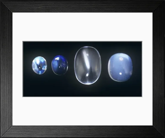 Framed Print : Moodstone cut as cabochons. A cabachon is a highly polished convex-cut gem Framed Print : Moodstone cut as cabochons. A cabachon is a highly polished convex-cut gem