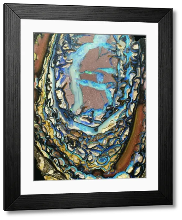 Framed Print : Opal. Boulder or nodular opal in a sandstone matrix from Queensland, Australia Framed Print : Opal. Boulder or nodular opal in a sandstone matrix from Queensland, Australia
