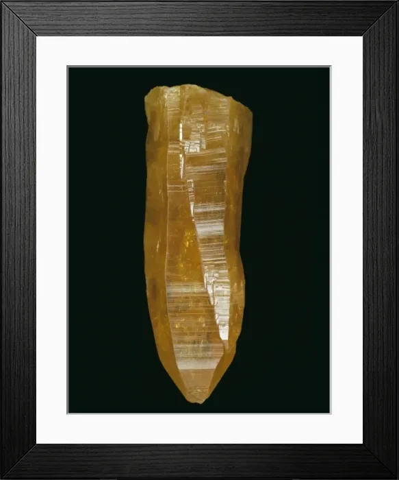 Framed Print : Mimetite. A tall, orange prismatic crystal of mimetite Framed Print : Mimetite. A tall, orange prismatic crystal of mimetite