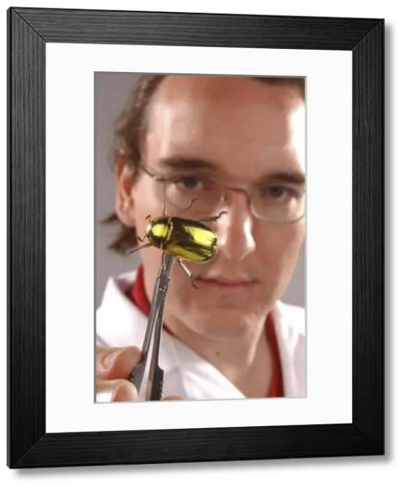 Framed Print : Max Barclay with beetle specimen Framed Print : Max Barclay with beetle specimen