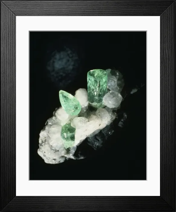 Framed Print : Emerald crystals and cut stone Framed Print : Emerald crystals and cut stone
