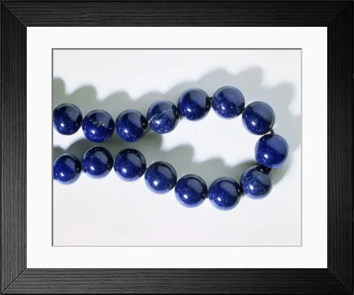 Framed Print : Lazurite. Necklace made from lazurite. Lazurite comprises of Framed Print : Lazurite. Necklace made from lazurite. Lazurite comprises of