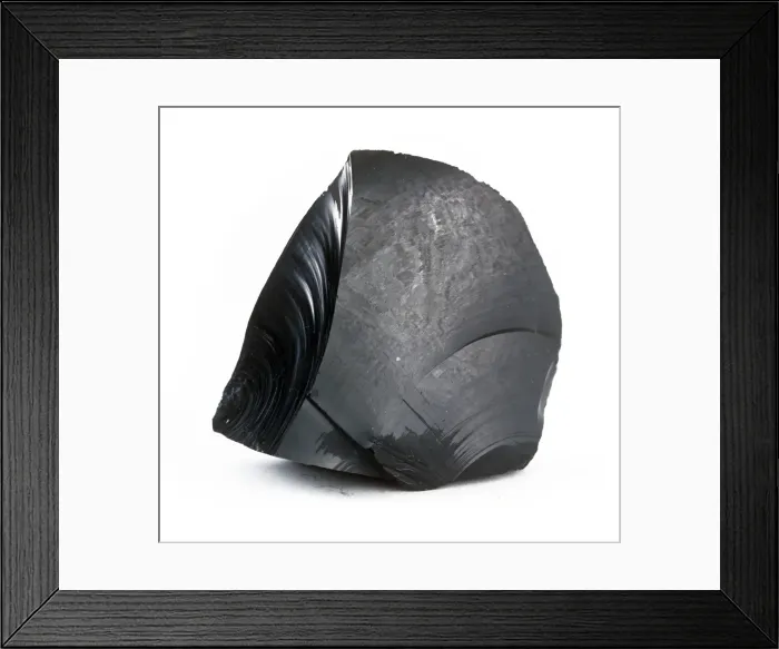 Framed Print : Obsidian. A glassy black material, formed when volcanic lava cools rapidly Framed Print : Obsidian. A glassy black material, formed when volcanic lava cools rapidly