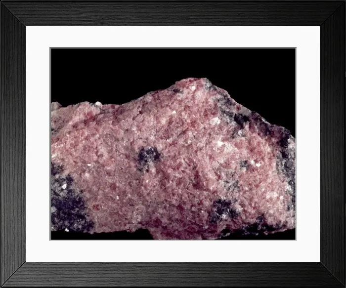 Framed Print : Rhodonite. A pink specimen of rhodonite (manganese iron magnesium calcium silicate) Framed Print : Rhodonite. A pink specimen of rhodonite (manganese iron magnesium calcium silicate)