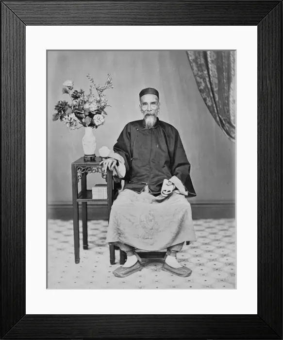 Framed Print : Elderly man seated, China Framed Print : Elderly man seated, China