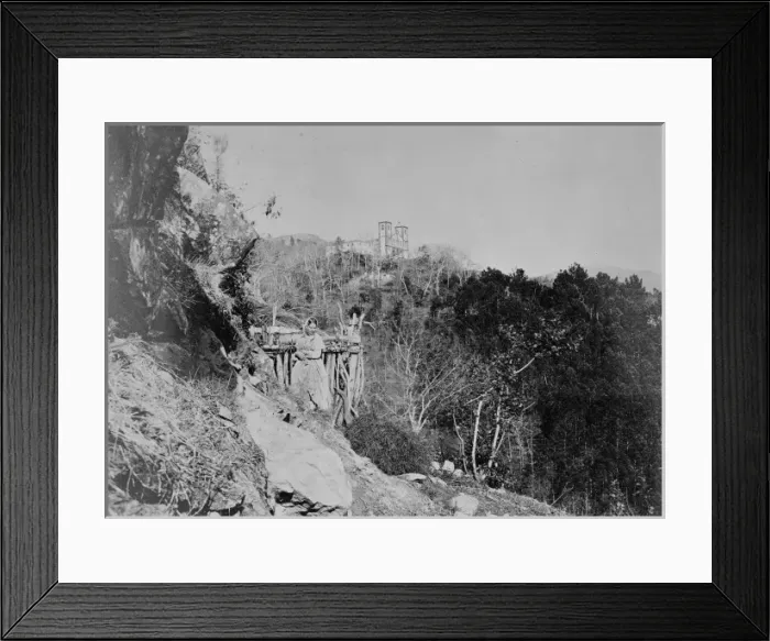 Framed Print : Buildings and figures on mountainside Framed Print : Buildings and figures on mountainside