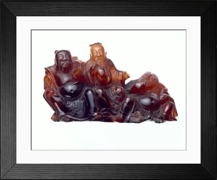 Framed Print : Carved piece of Chinese amber (length 120mm) Framed Print : Carved piece of Chinese amber (length 120mm)