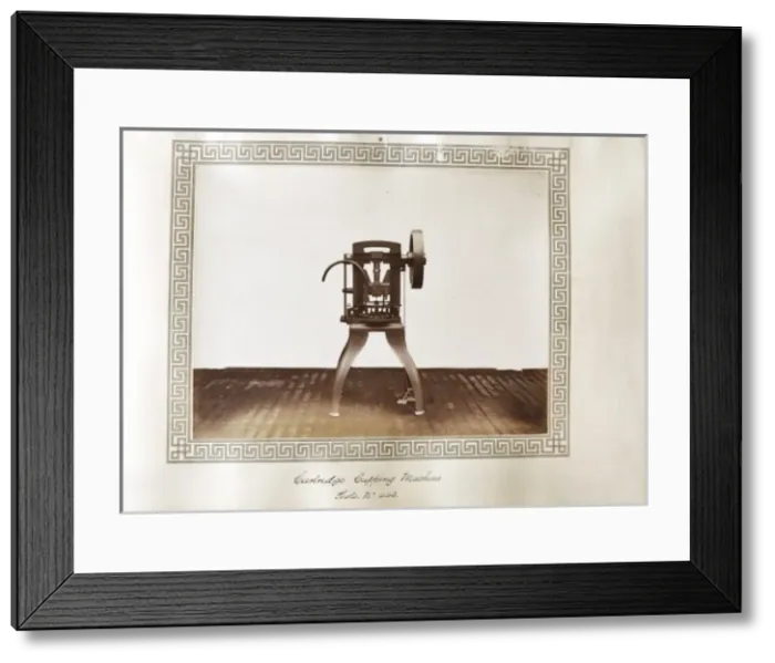 Framed Print : Cartridge cupping machine Framed Print : Cartridge cupping machine