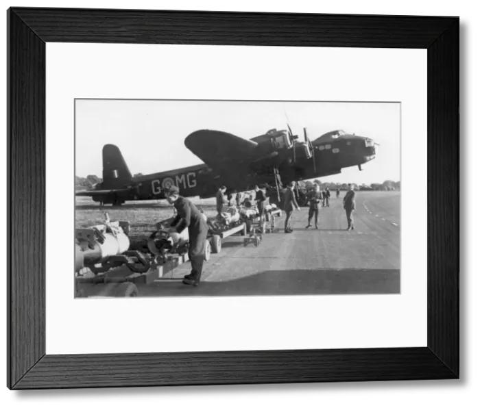 Framed Print : Short Stirling being bombed up Framed Print : Short Stirling being bombed up