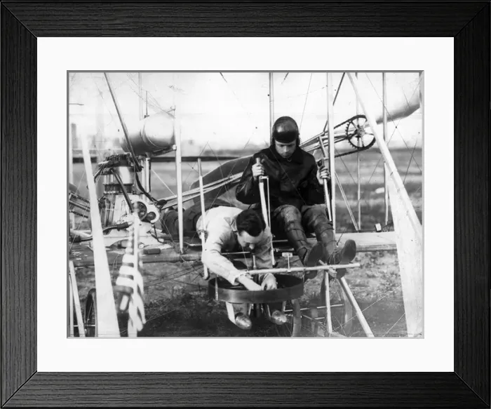 Framed Print : Riley E Scott preparing two 18lb bombs Framed Print : Riley E Scott preparing two 18lb bombs