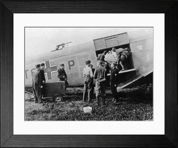 Framed Print : A Luftwaffe Junkers Ju52 / 3m is loaded with cargo Framed Print : A Luftwaffe Junkers Ju52 / 3m is loaded with cargo
