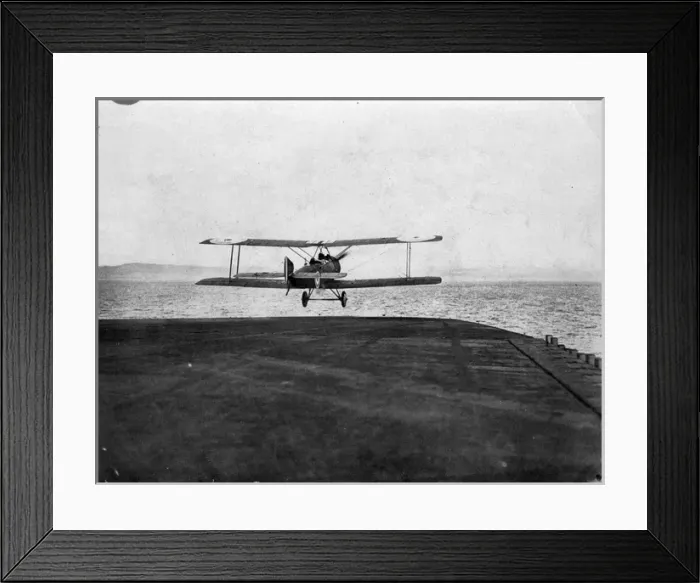 Framed Print : A Sopwith 1 1 / 2 Strutter takes-off from HMS Furious Framed Print : A Sopwith 1 1 / 2 Strutter takes-off from HMS Furious