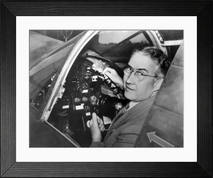 Framed Print : Glenn L Martin sitting in the cockpit of a Martin bomber