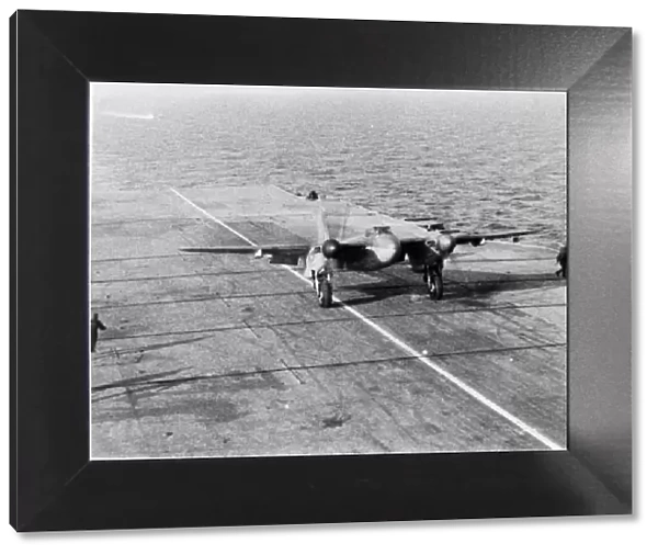A de Havilland Mosquito landing on a carrier deck (LR359ja)