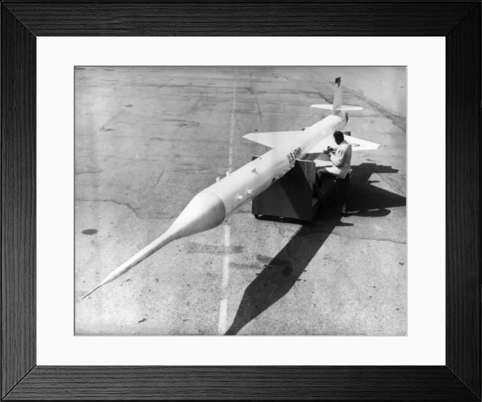 Framed Print : A technician checks over a Lockheed Kingfisher guided missil Framed Print : A technician checks over a Lockheed Kingfisher guided missil