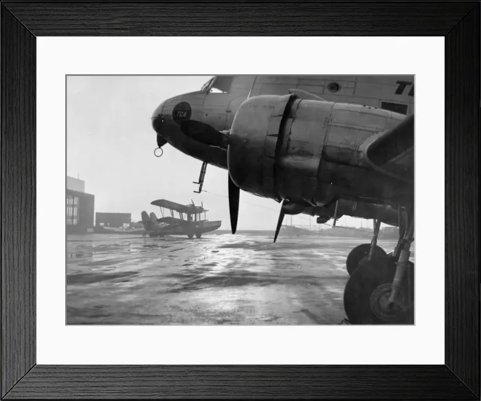 Framed Print : Douglas DC-3 with a Supermarine Stranraer in the background