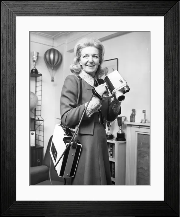 Framed Print : Sheila Scott And her lightweight Akai VT100 video recorder Framed Print : Sheila Scott And her lightweight Akai VT100 video recorder