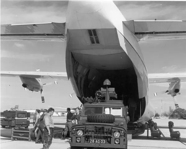 A Land Rover is unloaded from a RAF Short SC-5 Belfast CMk1