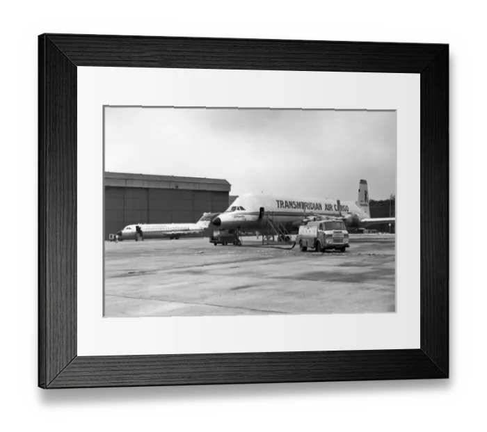 Framed Print : The sole Canadair CL-44-O N447T of Transmeridian Air Cargo Framed Print : The sole Canadair CL-44-O N447T of Transmeridian Air Cargo