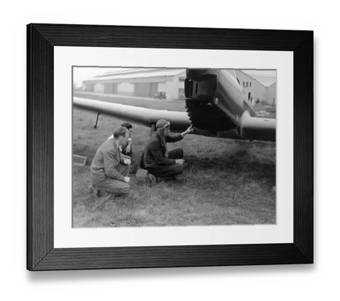 Framed Print : Charles A Lindbergh inspects his Miles M12 Mohawk G-AEKW Framed Print : Charles A Lindbergh inspects his Miles M12 Mohawk G-AEKW