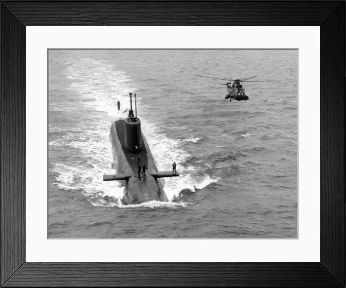 Framed Print : A Royal Navy Sea King alongside a submarine Framed Print : A Royal Navy Sea King alongside a submarine
