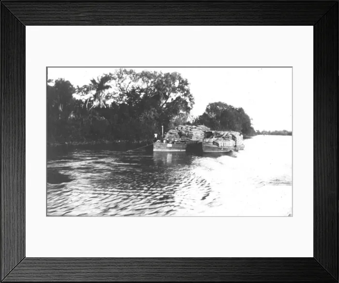 Framed Print : McCarthy Island (seed boat in river) Framed Print : McCarthy Island (seed boat in river)