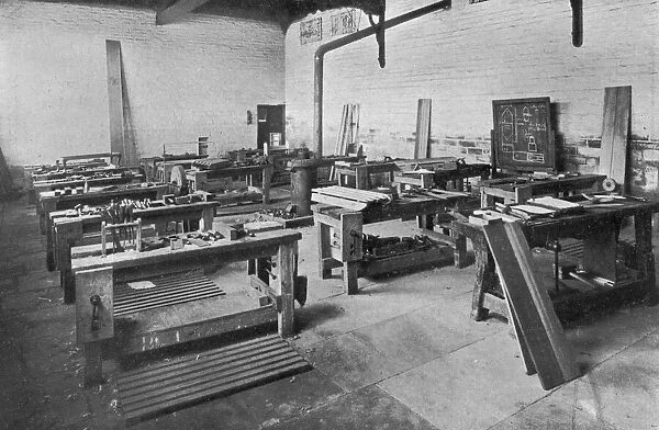 12917668. Carpentry benches and tools at the Crossley and Porter Orphanage, Halifax