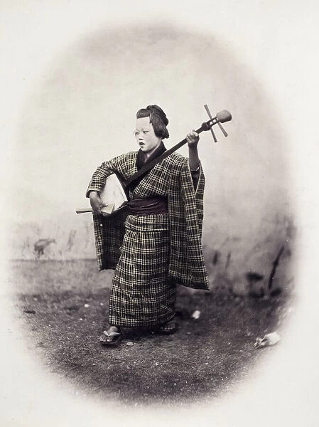 1860s Japan - portrait of a street singer with a shamisen Felice or Felix Beato