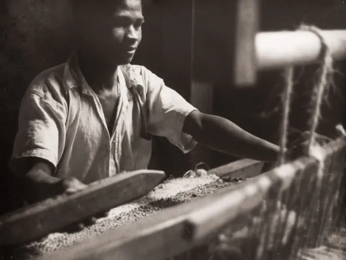 Framed Print : 1940s East Africa - hand loom and weaver at work Framed Print : 1940s East Africa - hand loom and weaver at work