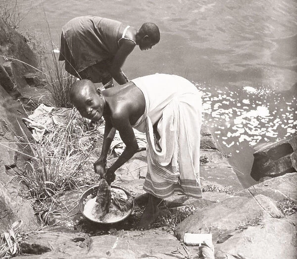1940s East Africa - Uganda washing clothes Lake Victoria