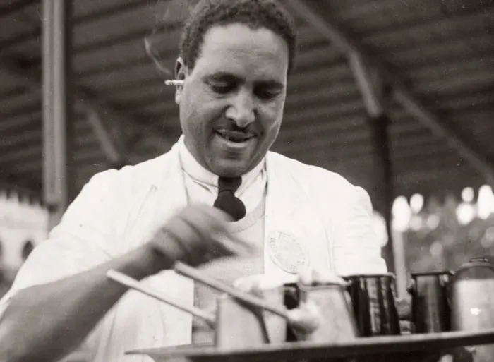Framed Print : 1943 Egypt waiter serving coffee with cigarette in ear Framed Print : 1943 Egypt waiter serving coffee with cigarette in ear