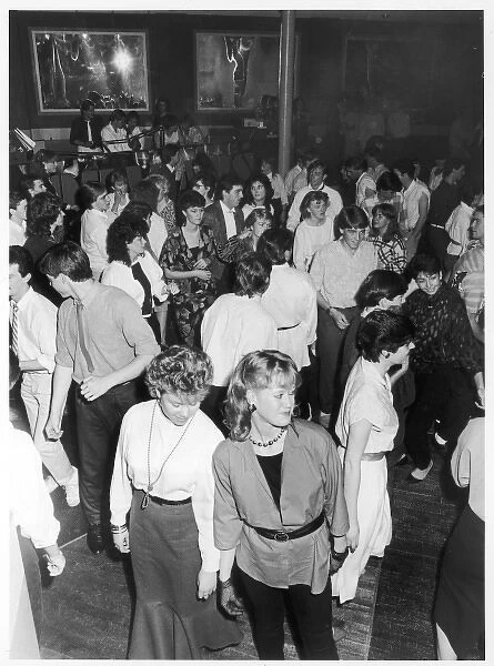 80S DISCO. Young people strutting their stuff on the dance floor